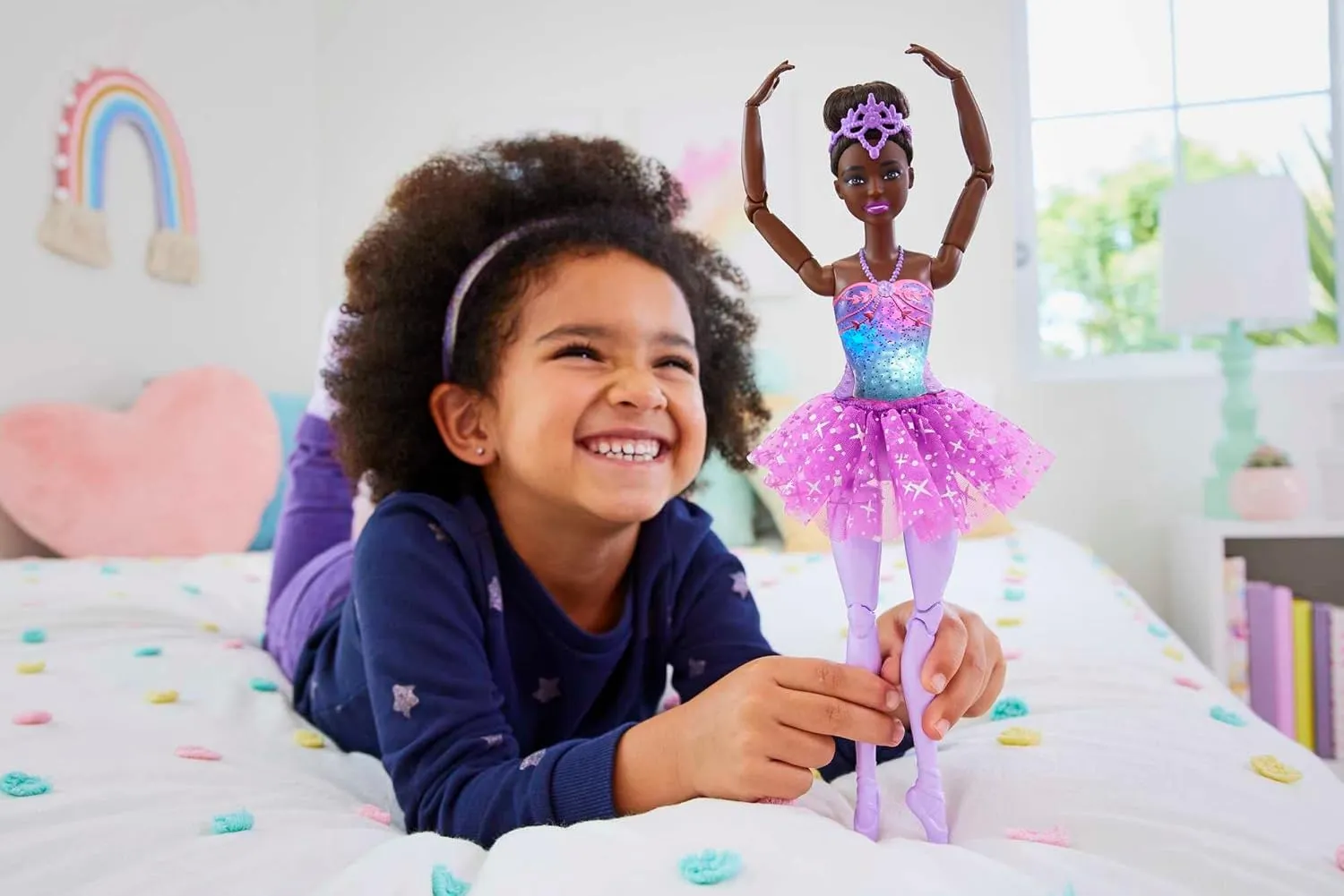 Barbie Dreamtopia Doll, Twinkle Lights Posable Ballerina with 5 Light-Up Shows, Sparkly Purple Tutu, Black Hair & Hair Accessory