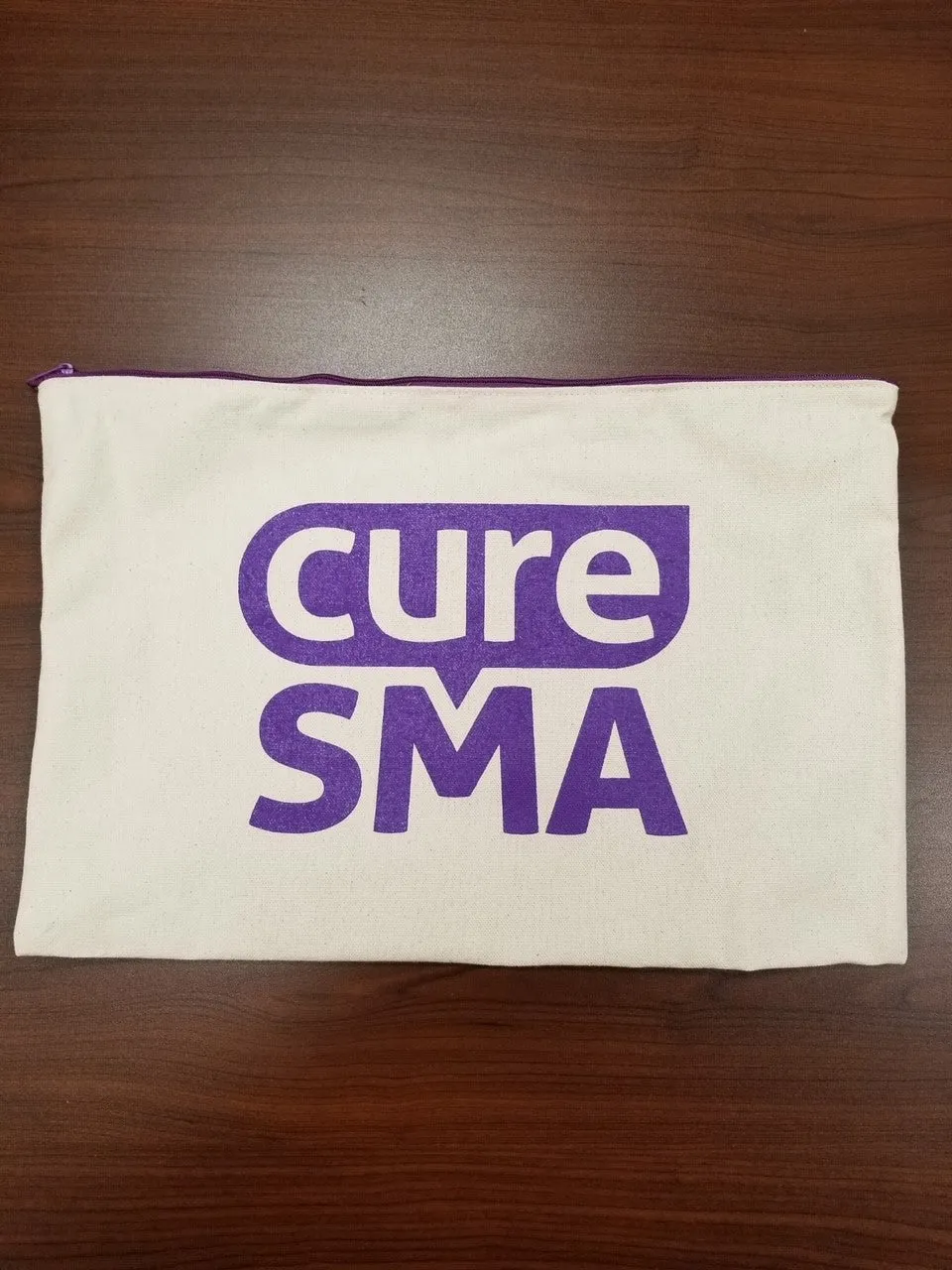 Cure SMA Zippered Pouch