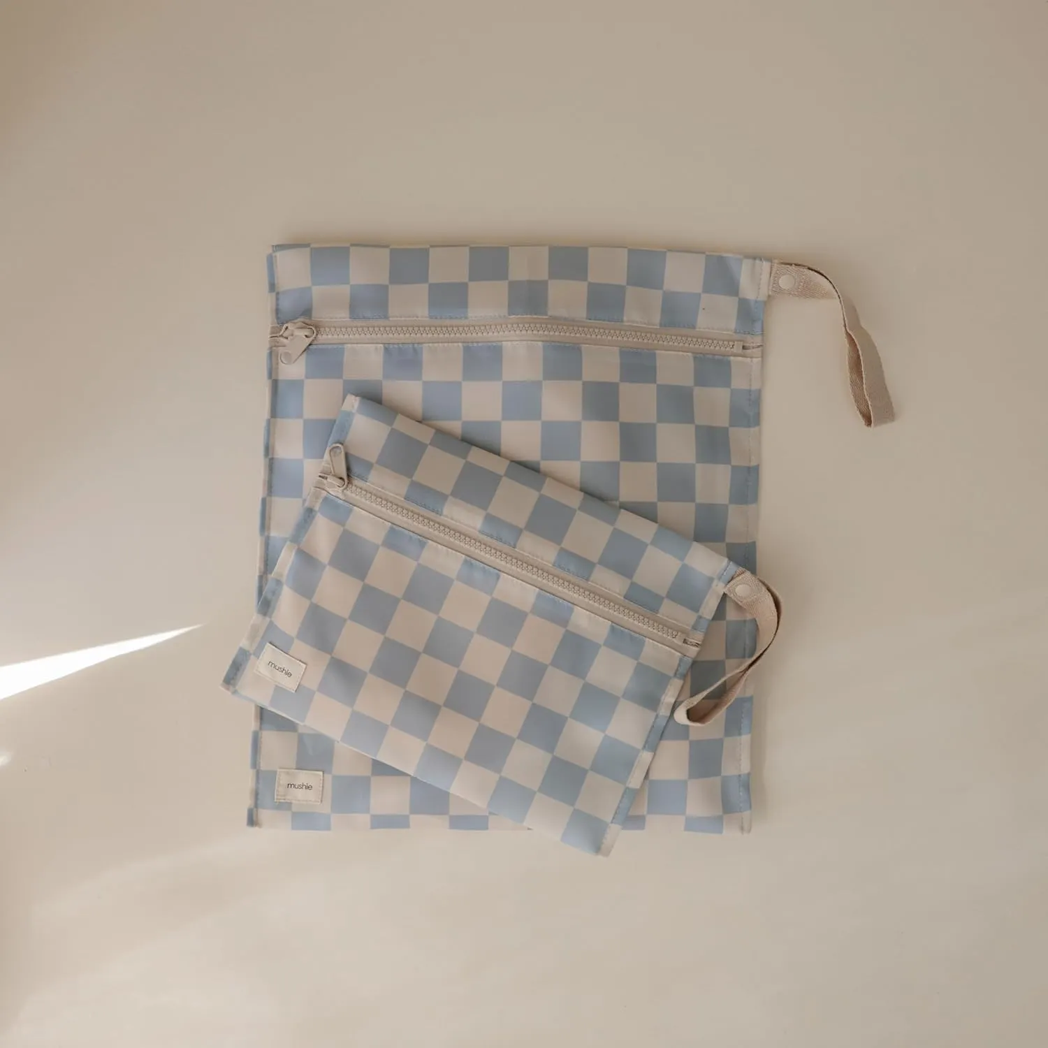 mushie Water Resistant Wet Bags | Large & Small Reusable Storage Bag for Baby Items and Travel | Zippered Pockets with Handle | Machine Washable, Set of 2 (Blue Check)